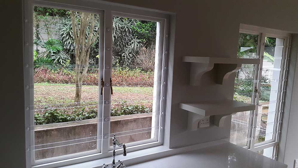 Invisible Security Bars: Can Burglars Break Clear Guards?