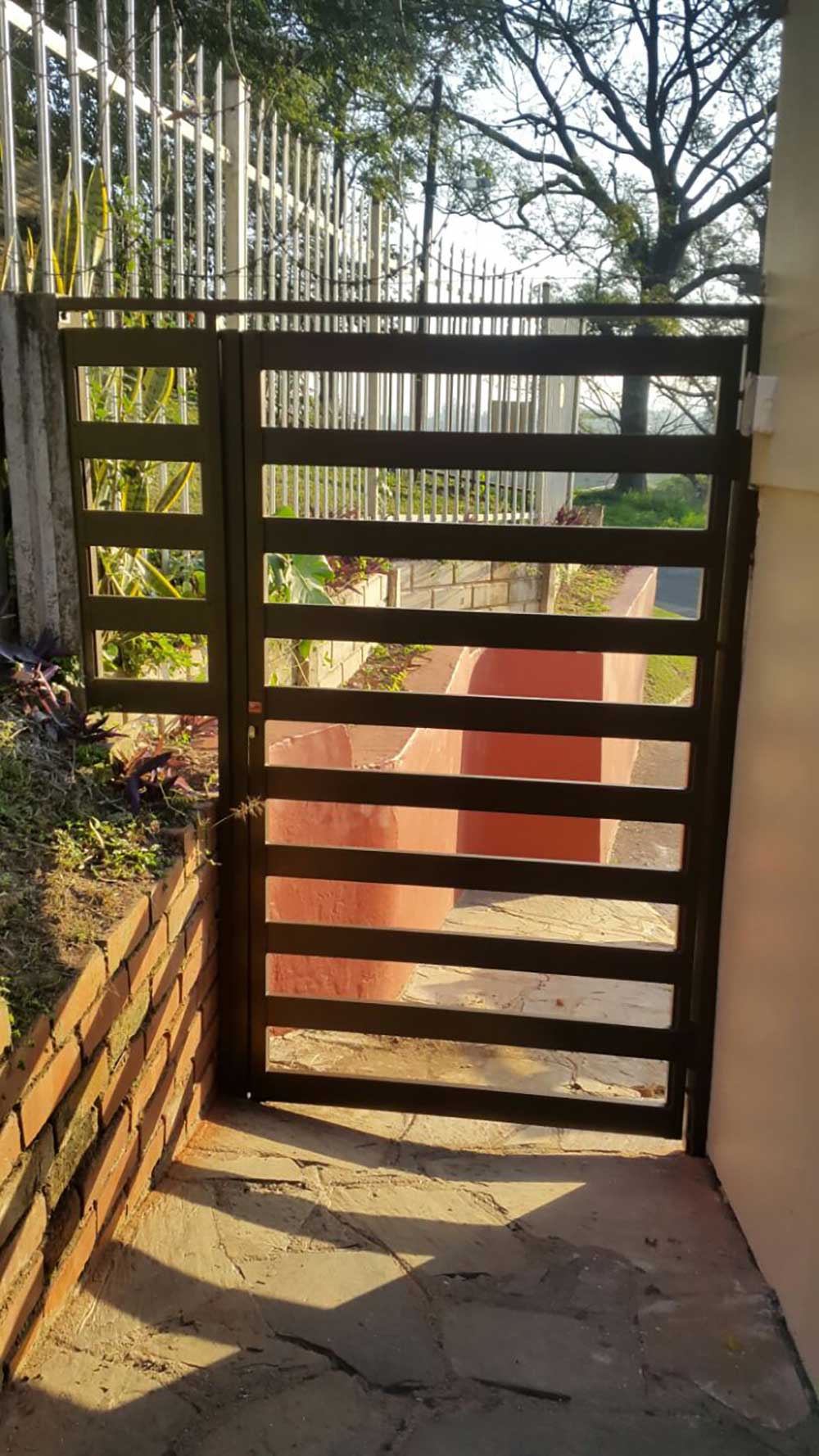 Custom Swing Gates: Securing Front Doors From Intruders